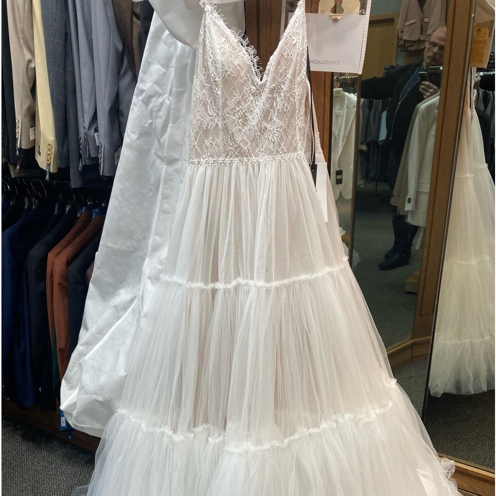 Wedding dress by Rish Bridal New never worn with tags. Size 2